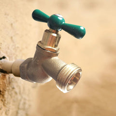 1/2 inch FIP lead free hose bibb installed on an outdoor wall